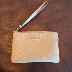 Coach Beige Embossed Wristlet